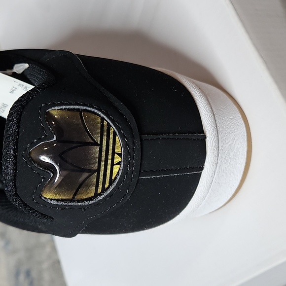 Men's Superstar Pure Black Sneakers Gold Trefoil Logo FZ2145 - Picture 3 of 8